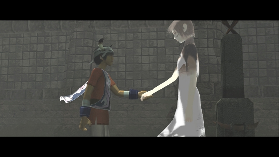 Ico holding Yorda's hand.